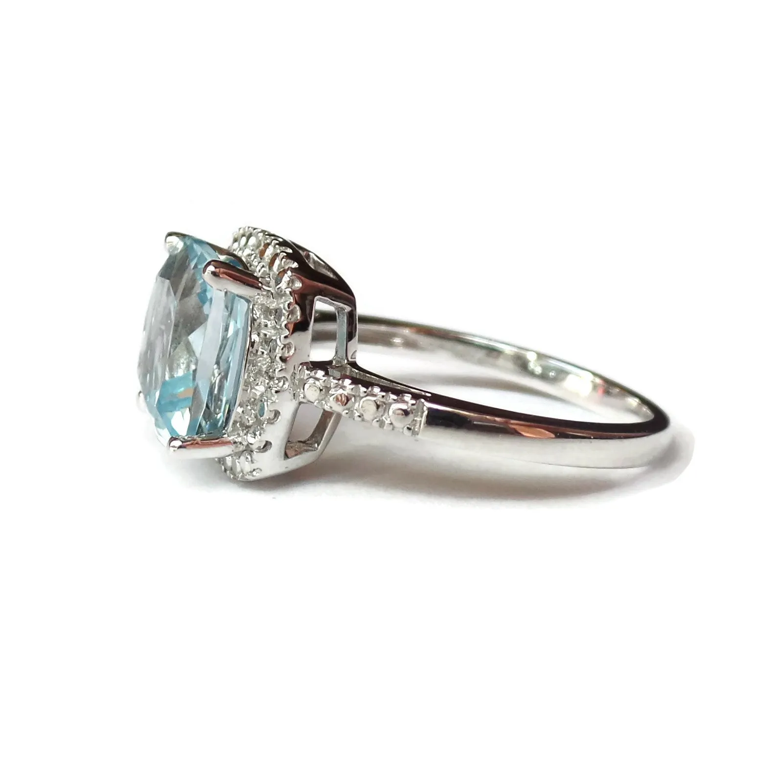 14k White Gold 9mm Cushion Cut Sky Blue Topaz & Diamond Halo-Style Ring