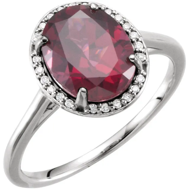 14K White Gold Oval Rhodolite Garnet & .06 CTW Diamond Halo Ring