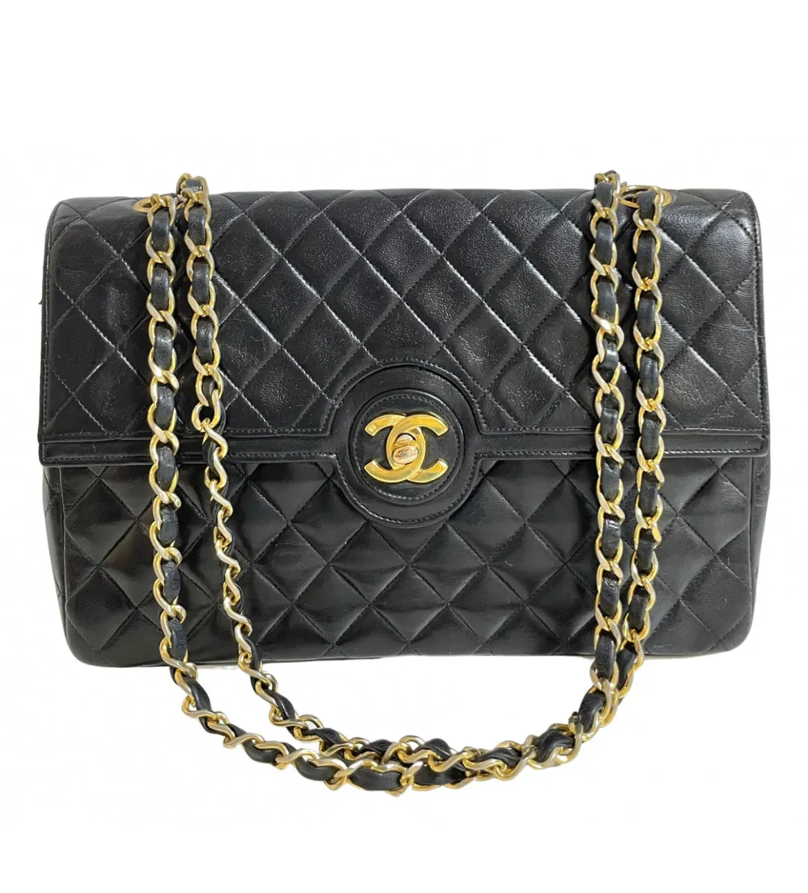 80's vintage Chanel black 2.55 shoulder bag with circle CC  flap design. Rare piece from the era. 0410283