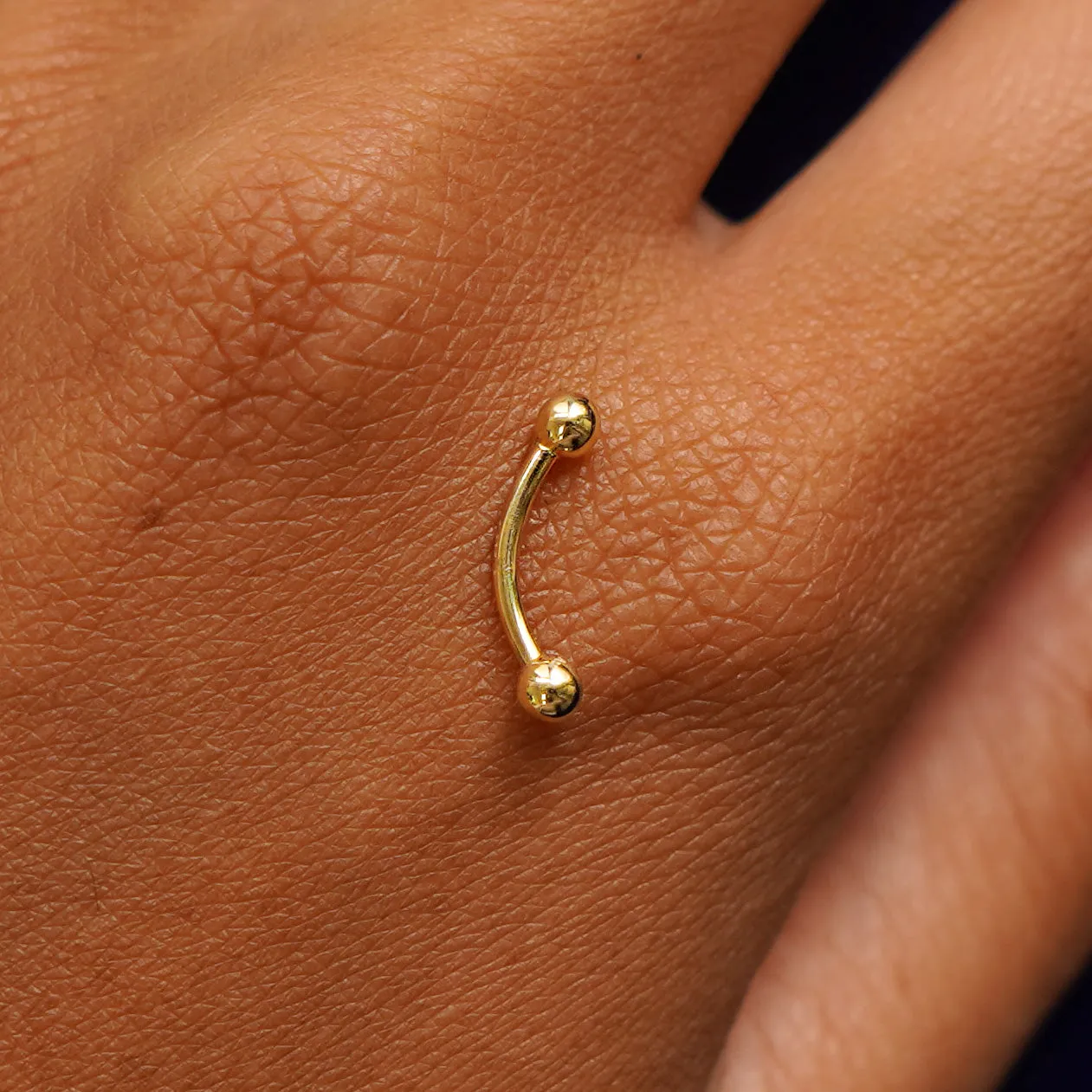 Small Curved Barbell Piercing