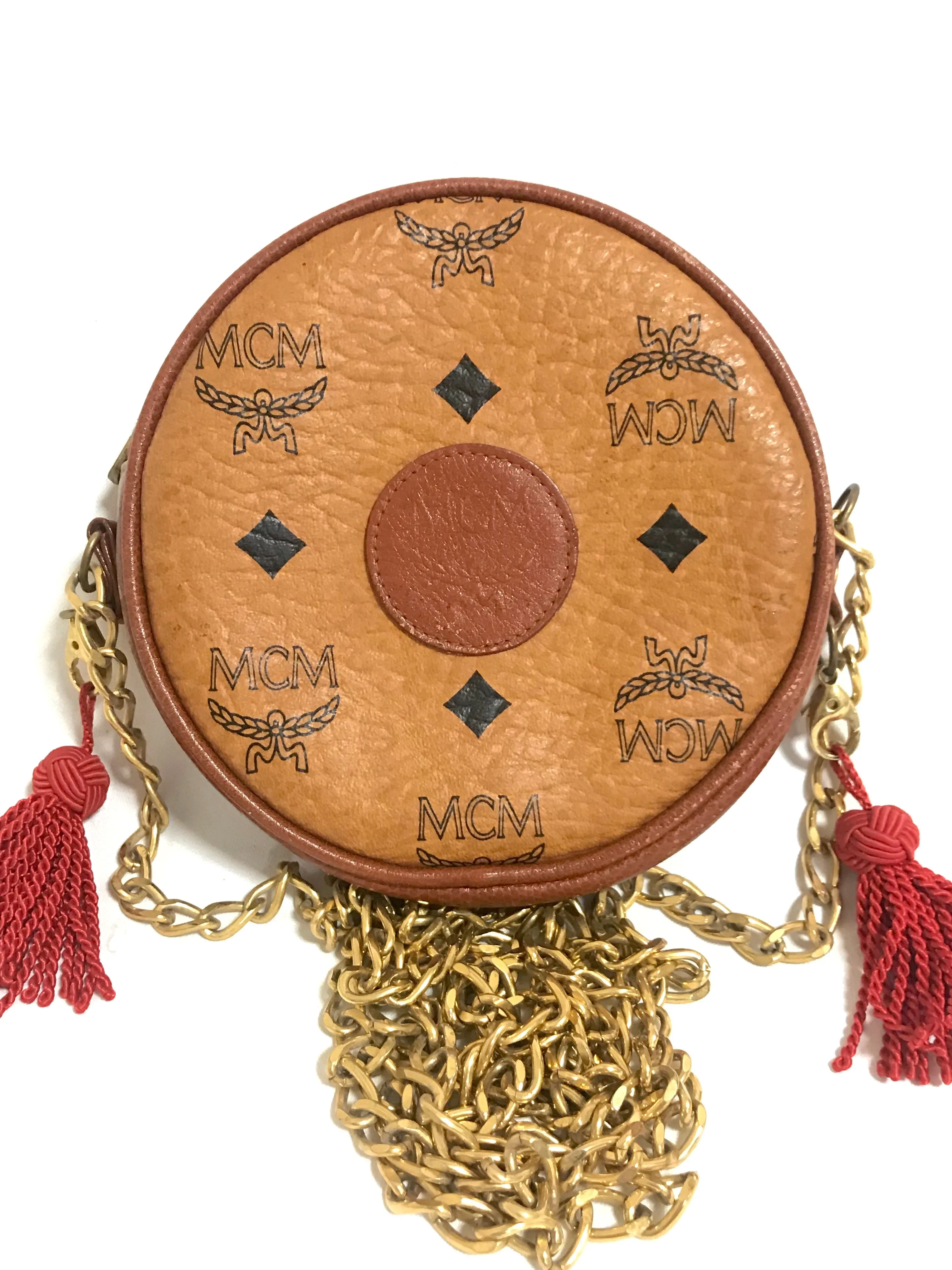 Vintage MCM brown monogram mini Suzy Wong chain shoulder purse with red fringes. Designed by Michael Cromer. Rare purse.